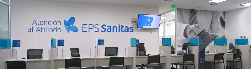 Recepción de EPS Sanitas y aviso en pared de Nuestro compromiso es contigo